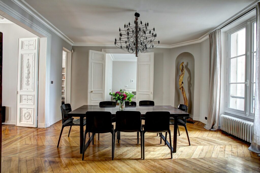 Sleek and elegant modern dining table inspired by classical design elements