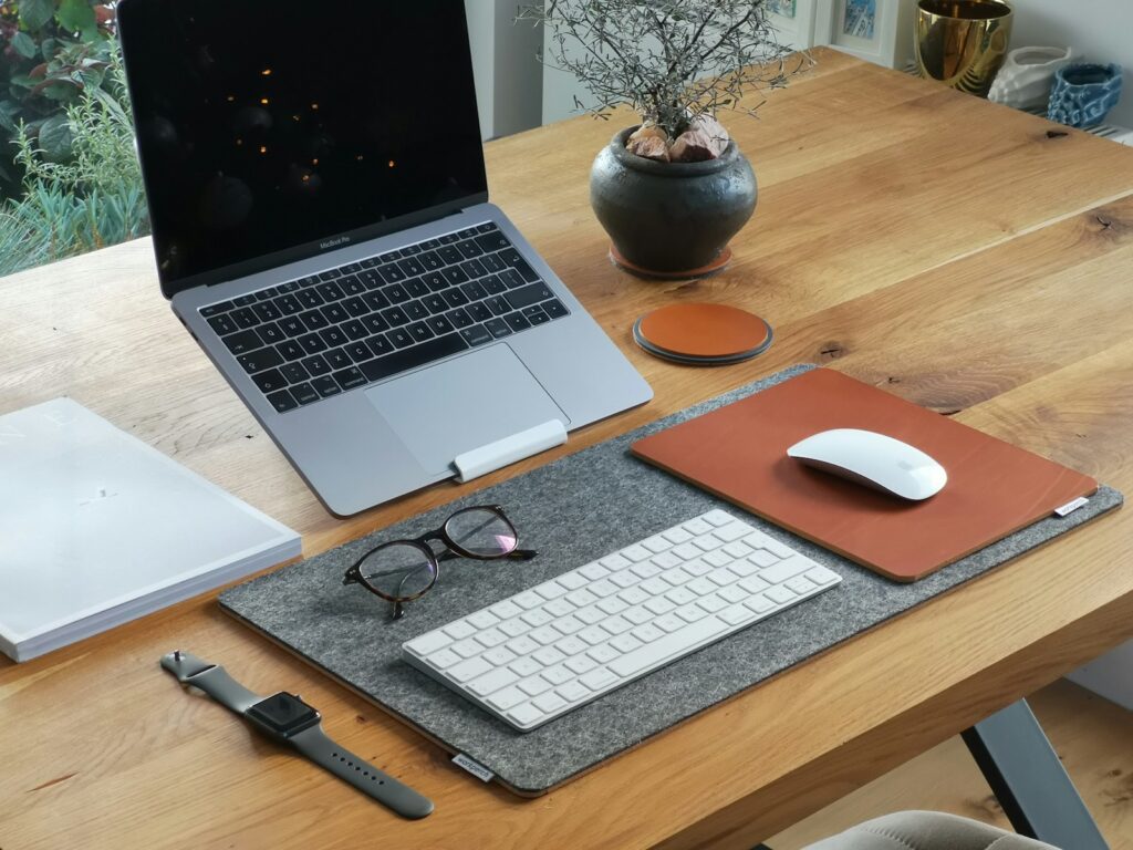 laptop stand at an ergonomic height, enhancing user comfort and productivity.